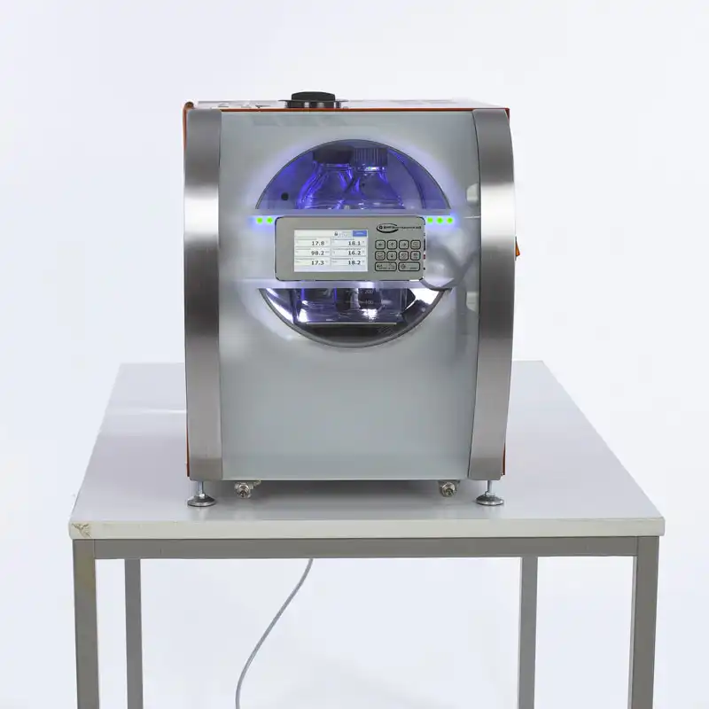 Woman operating steam sterilizer Laboklav 25 Woman operating steam sterilizer Laboklav 25